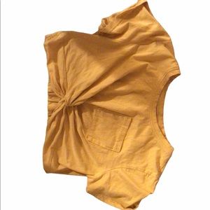 A yellow twisted crop top